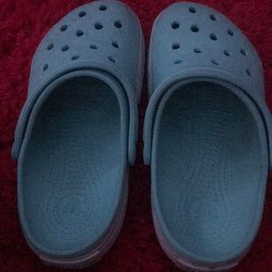Crocs, light blue, size 8 in women’s, size 6 in men’s